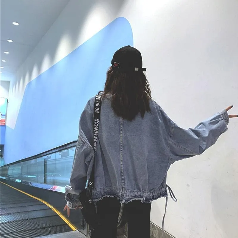 Oversized Denim Jacket With Ripped Hem And Pockets